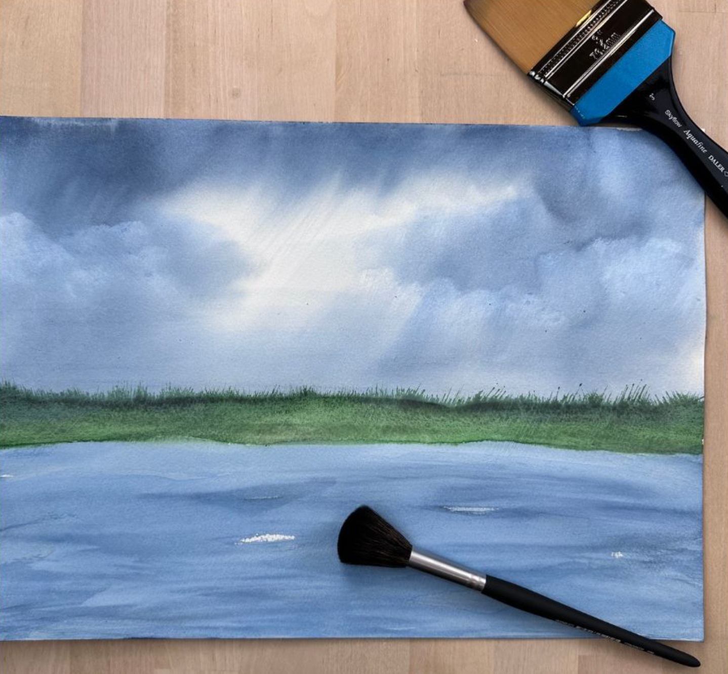 Sådan bruger du en mop pensel og en skyflow pensel i akvarel