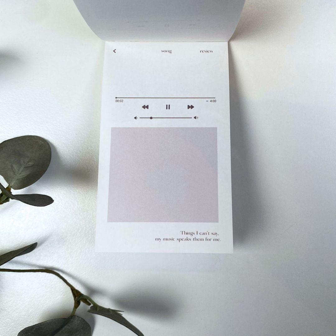 Notespapir med musikafspiller