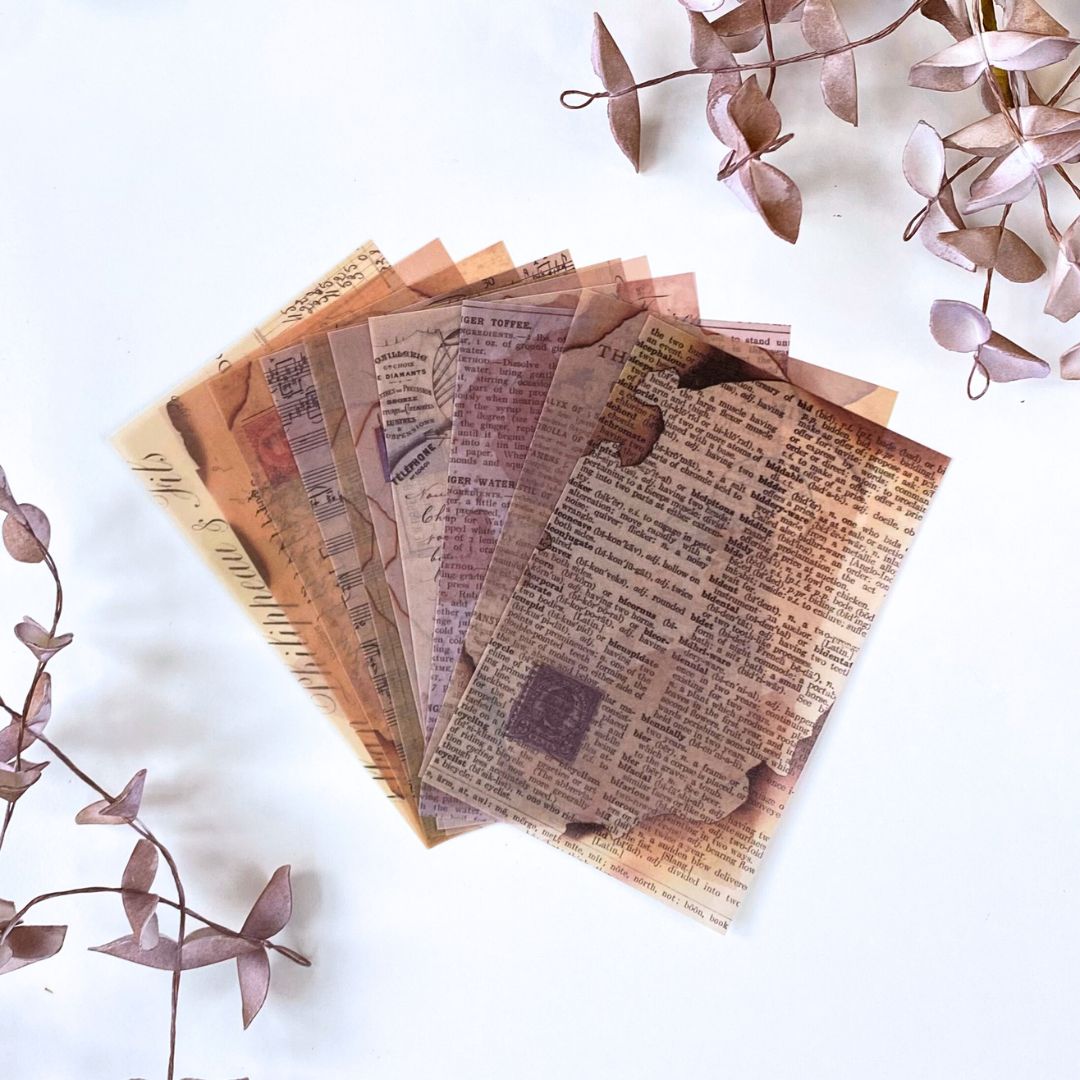 Designpapir med brændte breve