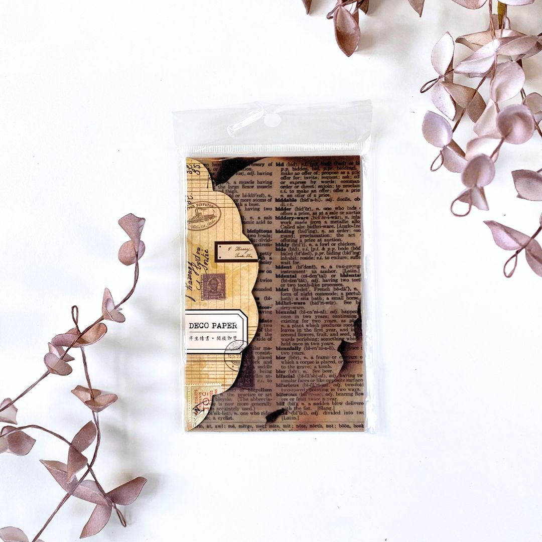 Designpapir med brændte breve